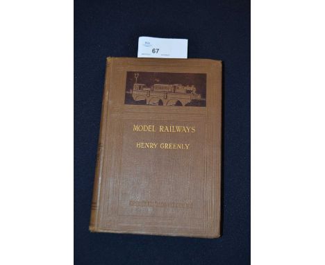 HENRY GREENLY: MODEL RAILWAYS, London, Cassell, 1924, First edition. Brown buckram, pictorial cover and gilt lettering