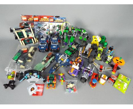 Lego - A quantity of pre built Lego vehicles including 2 x Agents of Shield pickup trucks, a Shield Fighter Plane and an unbo