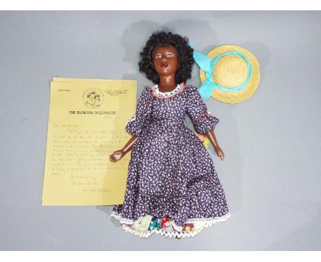 Islington Dollmakers - A vintage kit made Islington Dollmakers 'Althea'. The ceramic headed and limbed black doll appears to 