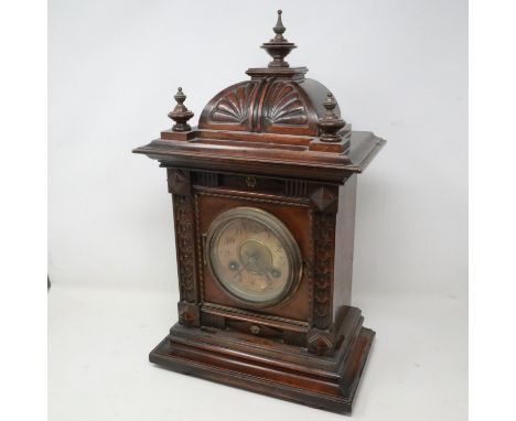 Junghans 19th century walnut cased bracket clock chiming on a gong, working at lotting, H: 45 cm, celluloid dial requires att