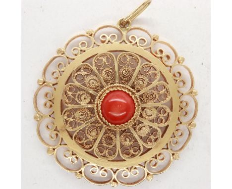 Gold filigree pendant set with coral stone to centre, marked 583, D: 35 mm, 6.1g. UK P&amp;P Group 1 (£16+VAT for the first l