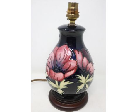 Moorcroft baluster form lamp base in the Anemone pattern, no chips or cracks, H: 28 cm. All electrical items in this lot have