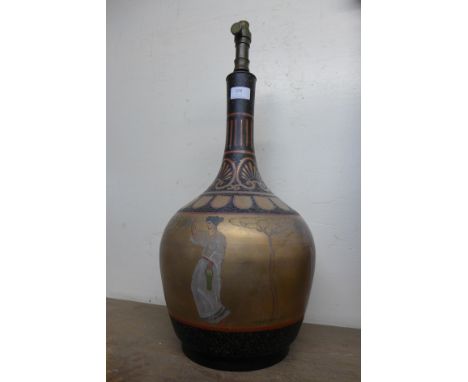 A Roman style table lamp
