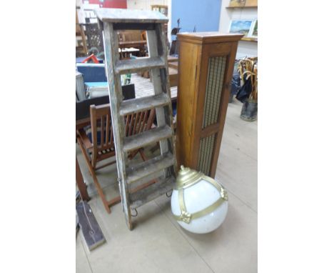 An Art Deco style light, stepladders and a cabinet