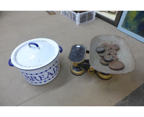 A set of vintage scales and weights and an enamelled bread bin