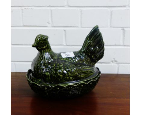 A Portmeirion green glazed ceramic hen on nest 