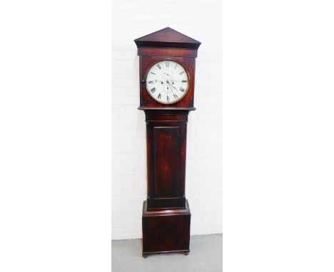 A mahogany long case clock, the hood with architectural domed top over an enamel dial with Roman numerals and inscribed Donal