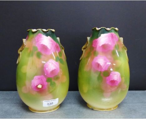 A pair of Wilkinson 'Rozane' patterned vases, 22cm high, (2) 