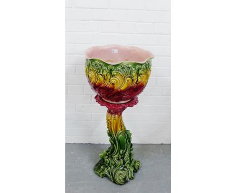 A Majolica jardiniere planter and stand