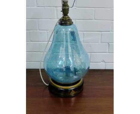 A blue glass pear shaped lamp base on a lacquered chinoiserie circular base, 45cm high excluding fittings