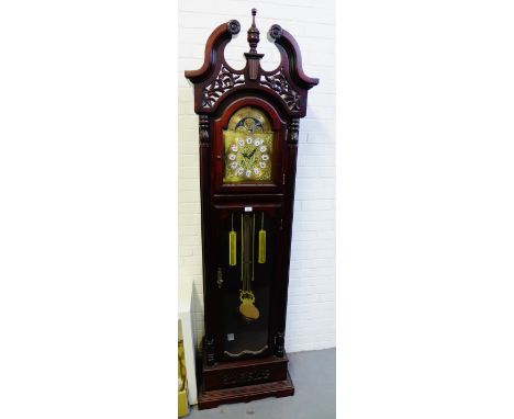 A contemporary hardwood grandfather clock, with broken swan neck pediment and urn finial over a brass dial with Roman numeral