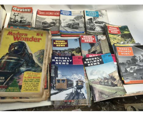 A collection of railway magazines, including Model railway news from 1953-1962, Trains illustrated 1957-1959 and Modern Wonde
