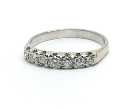 An 18ct white gold and seven stone diamond ring, approx 0.33ct, ring size approx S/T