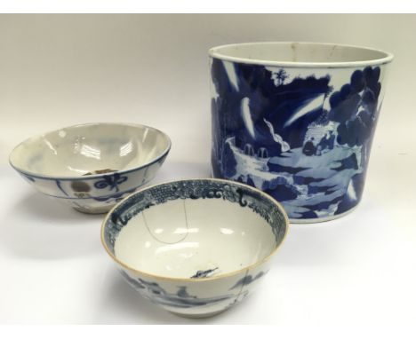 Four blue and white ceramic items comprising a scalloped dish and cover, two bowls and a vase, all damaged.