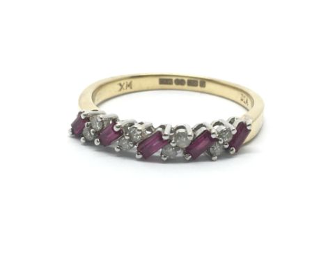 An 18ct yellow gold half eternity ring having five baguette cut rubies and eight small diamonds, ring size approx P