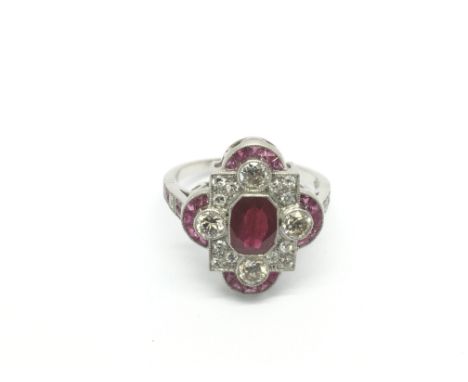 An Edwardian style platinum, ruby and diamond dress ring, diamonds approx 1.20ct, approx 4.9g and approx size M-N.