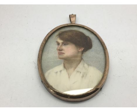 An Edwardian portrait miniature in a hallmarked silver gilt frame.
