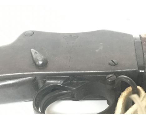 An Enfield 1887 Mark IV Henry Martini action Rifle the stock with various marks RP 5 1908 walnut stock with bayonet bracket a