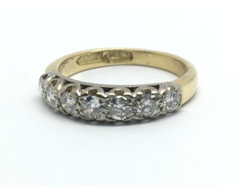 A 1940’s 18ct yellow gold and seven stone diamond ring, approx 0.75ct, ring size approx M