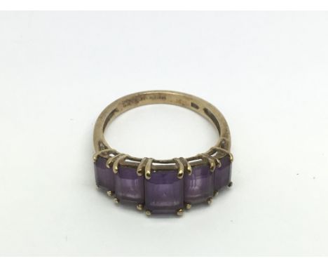 Another 9ct gold ring set with amethyst coloured stones, approx 2.6g and approx size M-N.