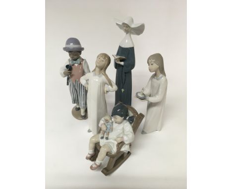 5 Lladro porcelain figurines.