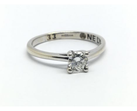 An 18ct white gold single solitaire diamond ring, approx 0.33ct, ring size approx M