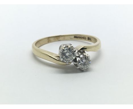 A 9ct yellow gold ring having two diamonds, approx 0.35ct, ring size approx I/J