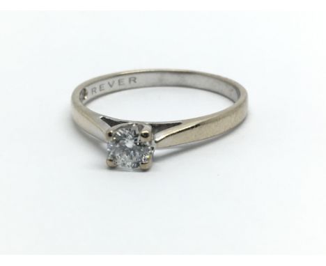 An 18ct white gold and diamond solitaire ring, approx 0.25ct, ring size approx L/M