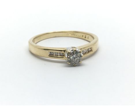 An 18ct yellow gold and diamond solitaire ring, approx 0.20ct, size approx M/N