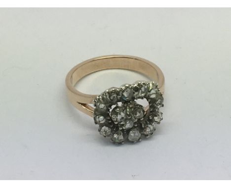 An unmarked rose gold and diamond ring, approx 4.1g and approx size M.