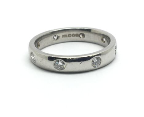 A platinum and diamond ring, having eight diamonds, approx 0.5ct, ring size approx L/M