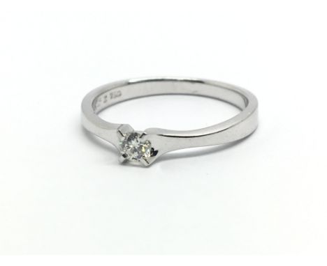 An 18ct white gold and diamond solitaire ring, approx 0.15ct, ring size approx L