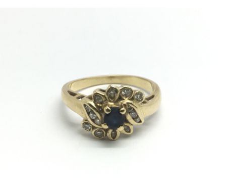 An 18ct gold sapphire and diamond ring, approx 3.4g and approx size L.