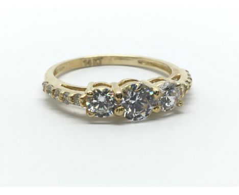 An 18ct yellow gold and CZ ring, size approx M/N