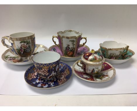 A collection of five cabinet cups and saucers including Dresden and Derby.