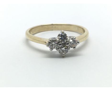 A 9ct yellow gold ring with four diamonds, approx 0.40ct, ring size approx O/P