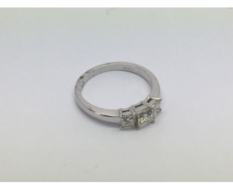 An 18ct white gold princess cut diamond trilogy ring, diamonds approx 0.75ct, approx 3.4g.