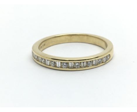 An 18ct yellow gold and diamond half eternity ring, ring size approx K