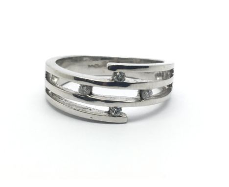 A 9ct white gold ring, with four small diamonds, ring size approx M/N