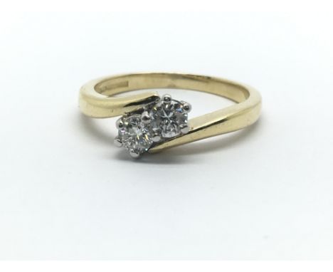 An 18ct yellow gold two stone diamond ring, approx 0.30ct, ring size approx K/L