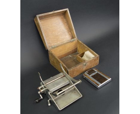 VINTAGE LEMAIRE CIGARETTE ROLLING MACHINE, wooden box; and a Ronson lighter/cigarette case. (2)