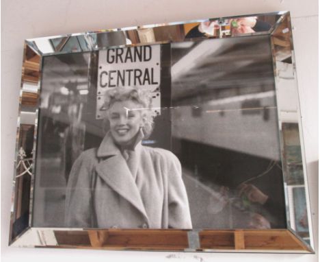 MARILYN MONROE PHOTOGRAPHIC PRINT, at Grand Central Station, in a mirrored frame, 90cm x 70cm. 