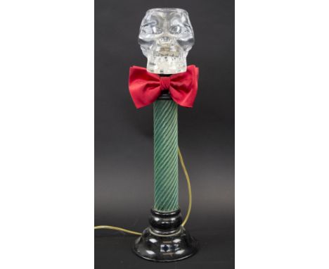 TABLE LAMP, 20th century moulded clear and green glass with shade in the form of a skull on a spiral column, 41cm H. 