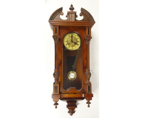 Antique Vienna Regulator Clock. Carved Wood Case. Unsigned. Key and pendulum included. Good condition. The gallery does not w