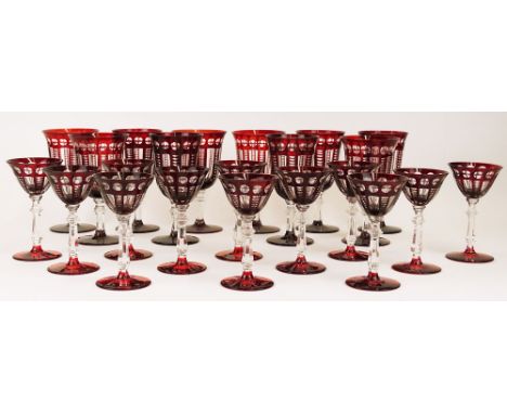 Twenty-two (22) antique ruby to clear cut glasses. This lot includes 10 water goblets 6-3/4 inches and 12 wine glasses 5-1/2 