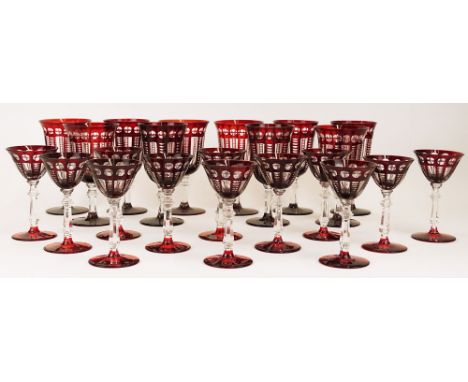 Twenty-two (22) antique ruby to clear cut glasses. This lot includes 10 water goblets 6-3/4 inches and 12 wine glasses 5-1/2 