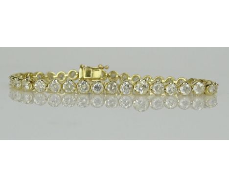 AIG Certified 8.57 Carat Diamond and 18 Karat Yellow Gold Tennis Bracelet. The round brilliant cut diamonds of I1 to I 2 clar
