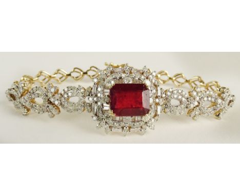 AIG Certified 6.76 Carat Ruby and 3.80 Carat Diamond 14K Yellow Gold Bracelet. Rectangular step cut ruby, slightly purpleish 