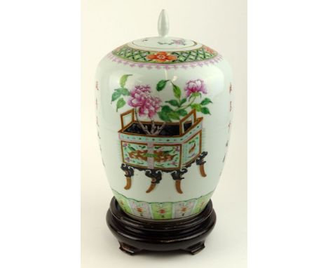 Chinese Famille Rose porcelain melon jar with calligraphy on carved wood base. Slight chip to rim and finial otherwise good c