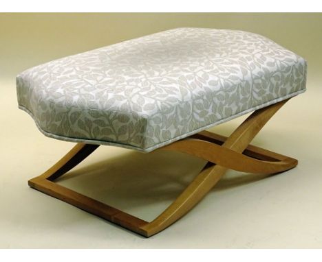 Bench/ottoman by Angelo Donghia features an X-shaped blonde wood base and a comfortable seat. Signed with original label Dong